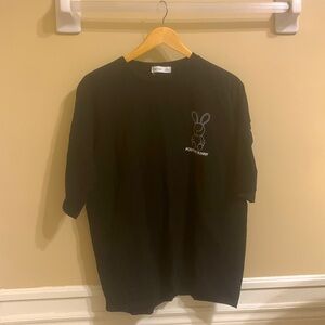 Black “positive bunny” shirt